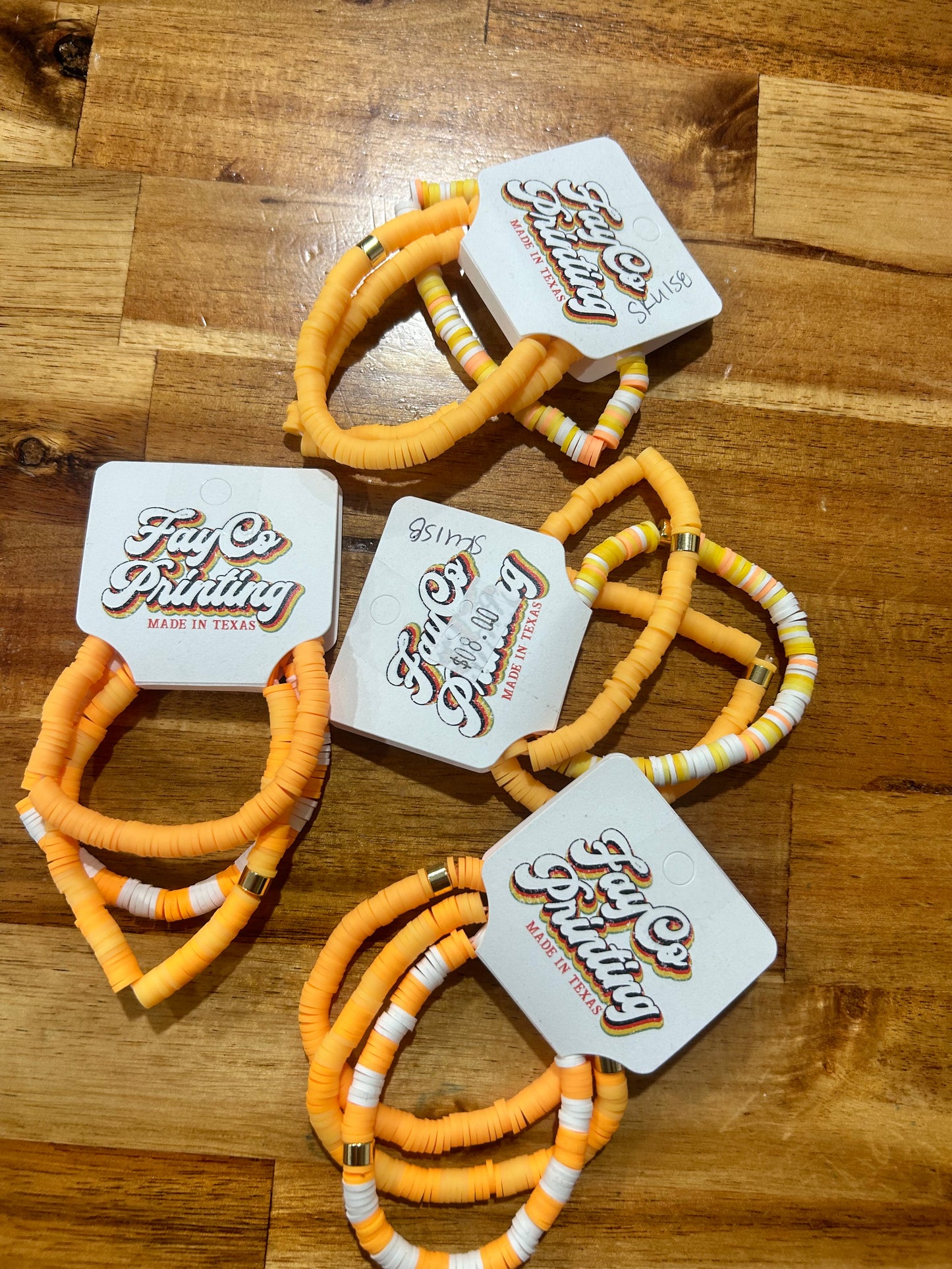Orange & White Beaded Bracelets